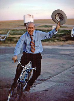 Kenneth I.Greisen rides a bike