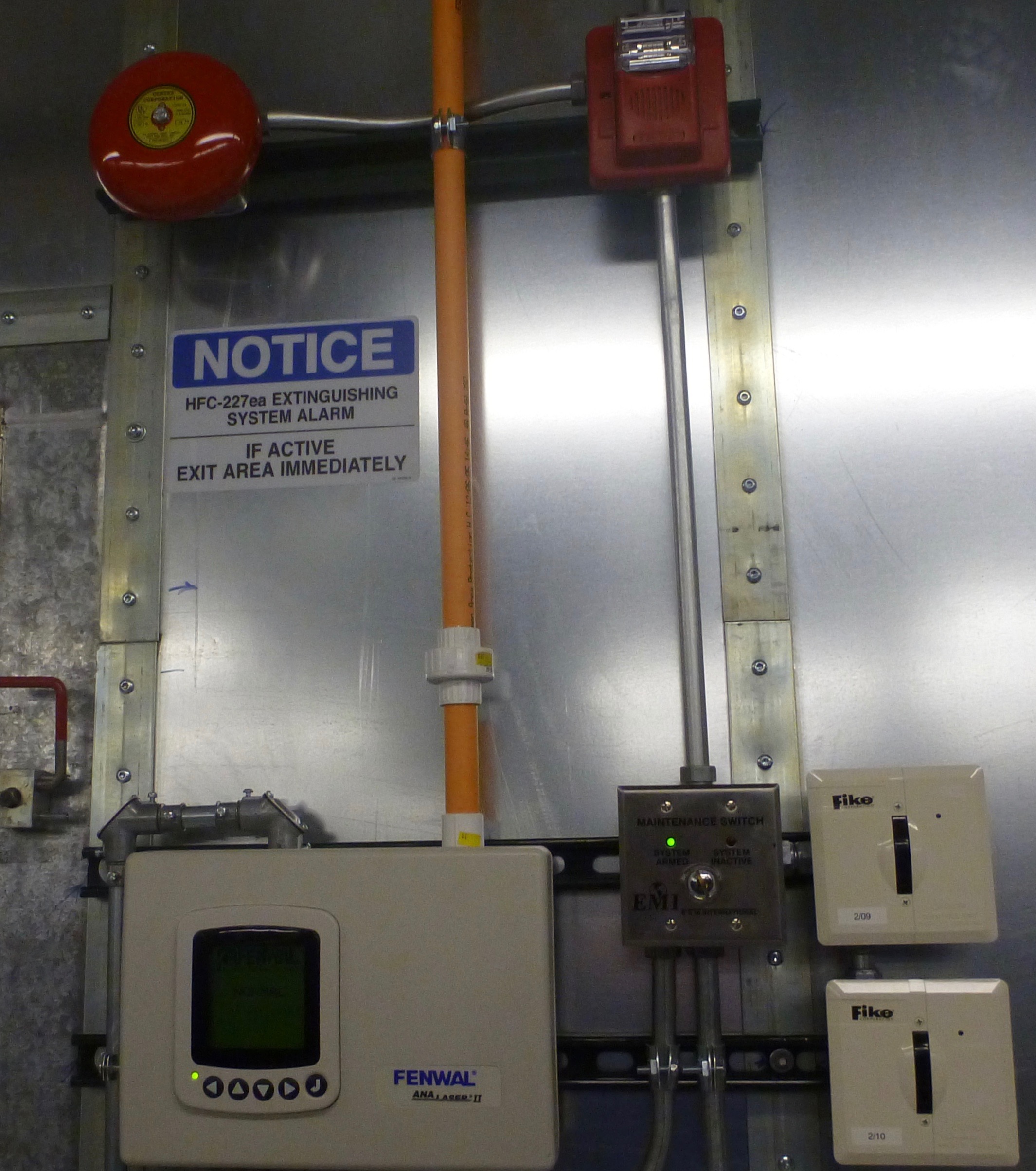 Photograph of one of the bell and the horn & strobe
	       and their control modules.